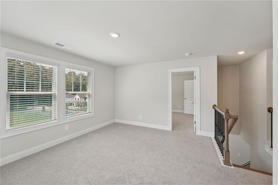 Spacious, unfurnished interior of a new home in Hemingway - Reserve Series, Cumming (Image 45).