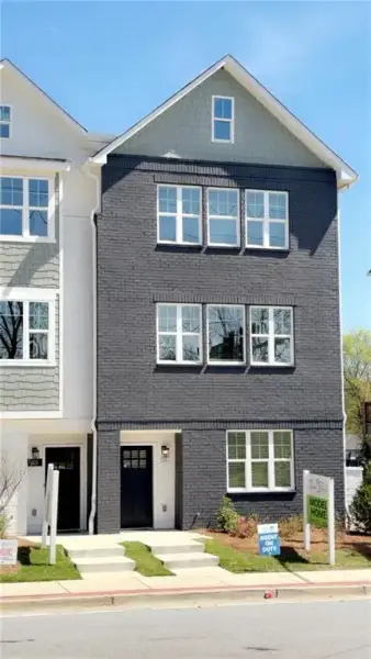 Front exterior of a new home in , Atlanta, GA, highlighting curb appeal (Image 1). Front exterior of a new home in , Atlanta, GA, highlighting curb appeal (Image 1).