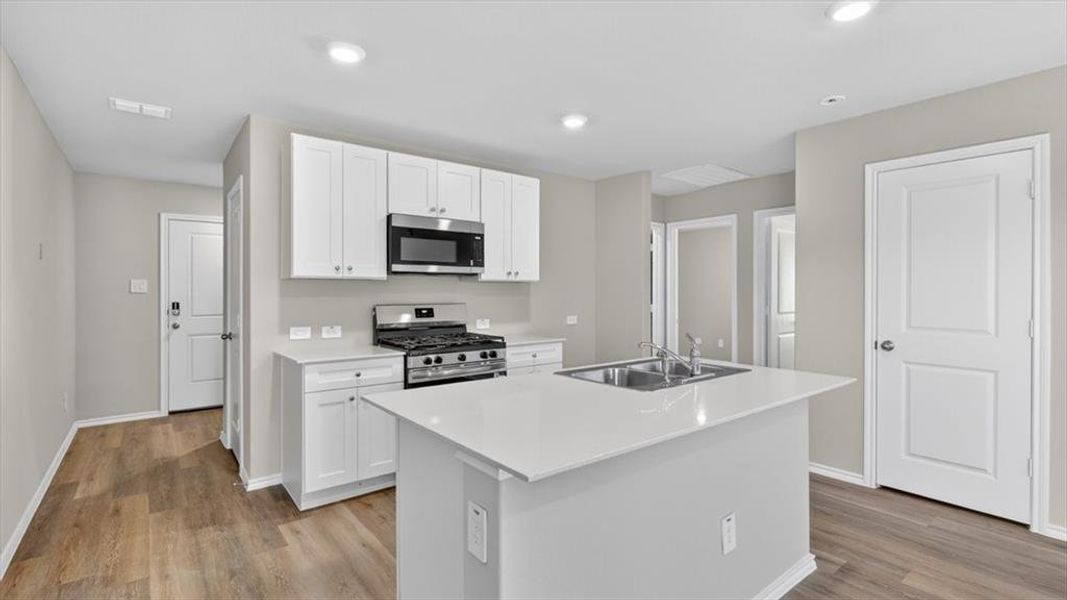 Kitchen- All Home and community information, including pricing, included features, terms, availability and amenities, are subject to change at any time without notice or obligation. All Drawings, pictures, photographs, video, square footages, floor plans, elevations, features, colors and sizes are approximate for illustration purposes only and will vary from the homes as built.