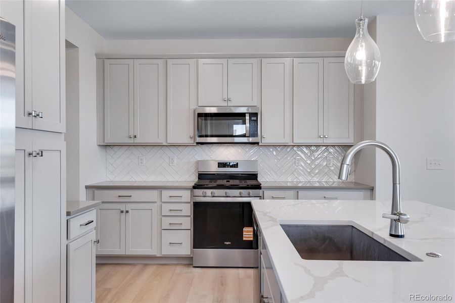 Furnished interior view inside a new home in Crescendo at The Aurora Highlands, Aurora (Image 10).