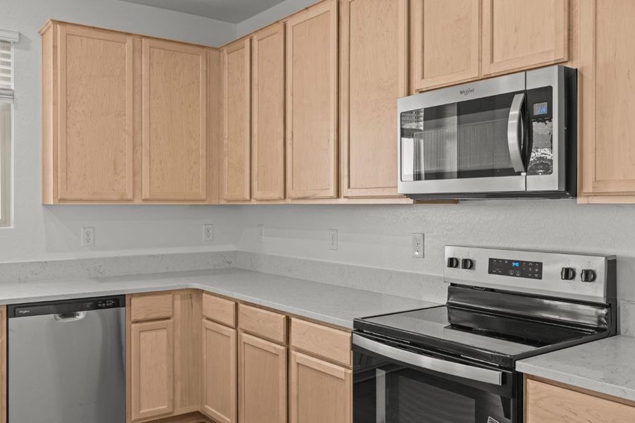 Furnished interior view inside a new home in Skyline Village Enclaves, San Tan Valley (Image 4).