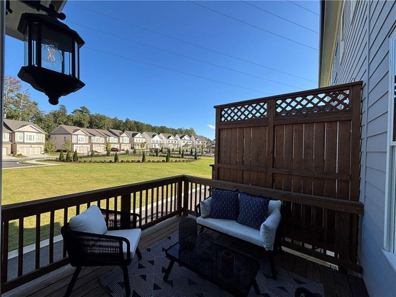 Exterior details and patio area of a home in Brackley Townhomes, Cumming (Image 4). Exterior details and patio area of a home in Brackley Townhomes, Cumming (Image 4).