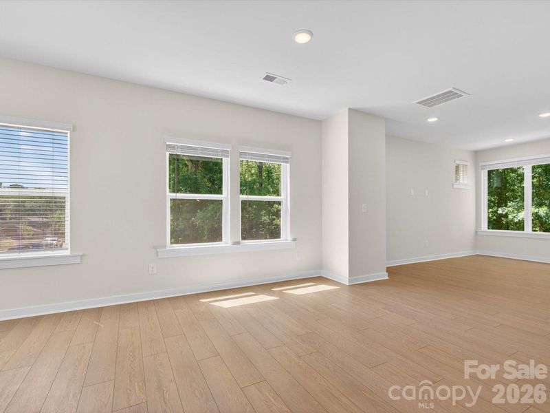 Spacious, unfurnished interior of a new home in Central Living at Craig, Charlotte (Image 25).