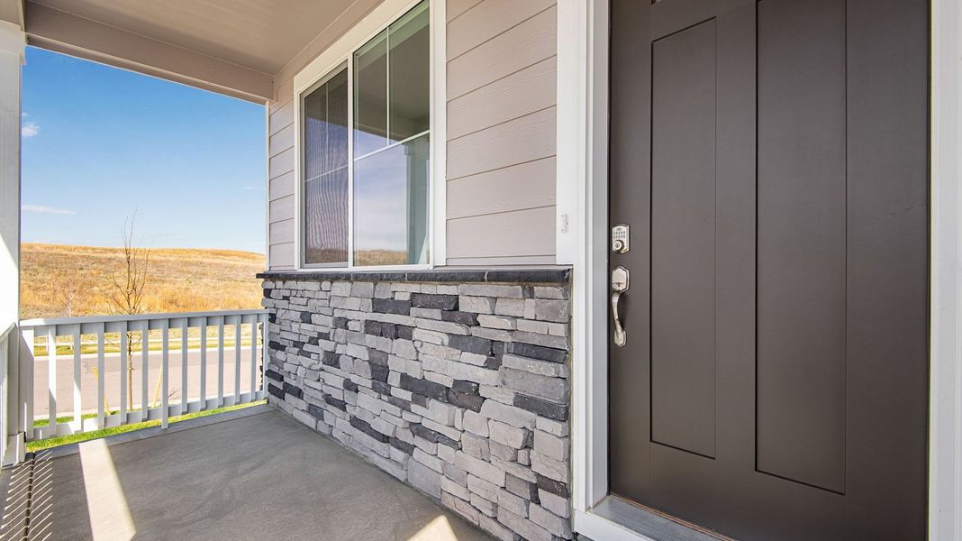 Exterior details and patio area of a home in Trails at Crowfoot, Parker (Image 3). Exterior details and patio area of a home in Trails at Crowfoot, Parker (Image 3).