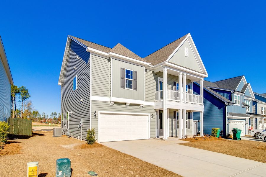 Front exterior of a new home in Hendrix Farms, Lexington, SC, highlighting curb appeal (Image 21).