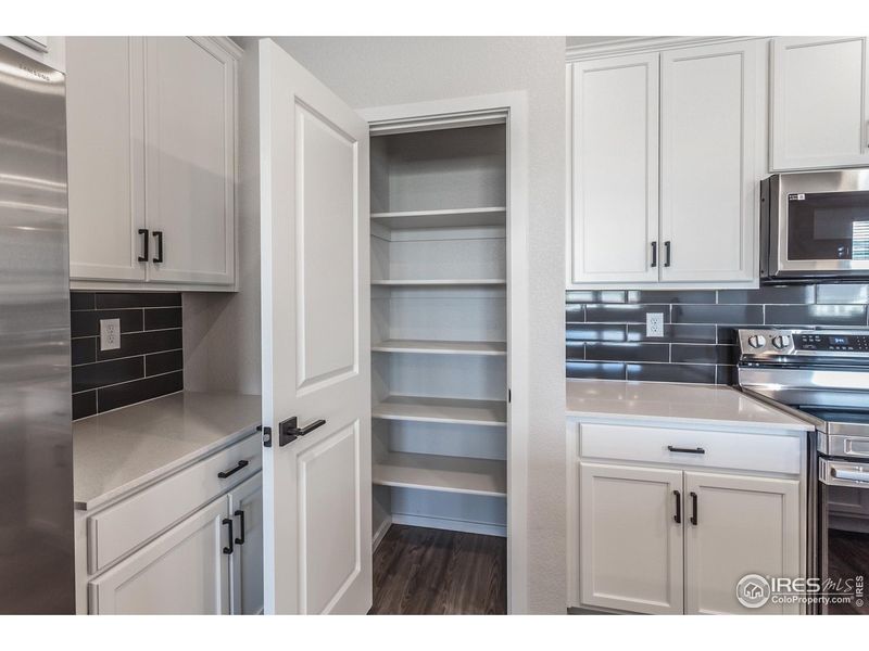 Furnished interior view inside a new home in Raindance Condos, Windsor (Image 15).