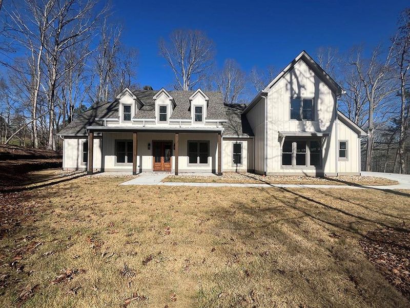 Front exterior of a new home in , Ball Ground, GA, highlighting curb appeal (Image 22).