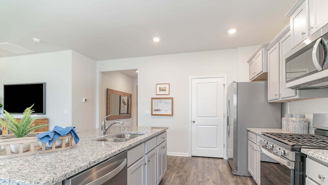 Furnished interior view inside a new home in The Reserve at Wild Horse, Conway (Image 7).