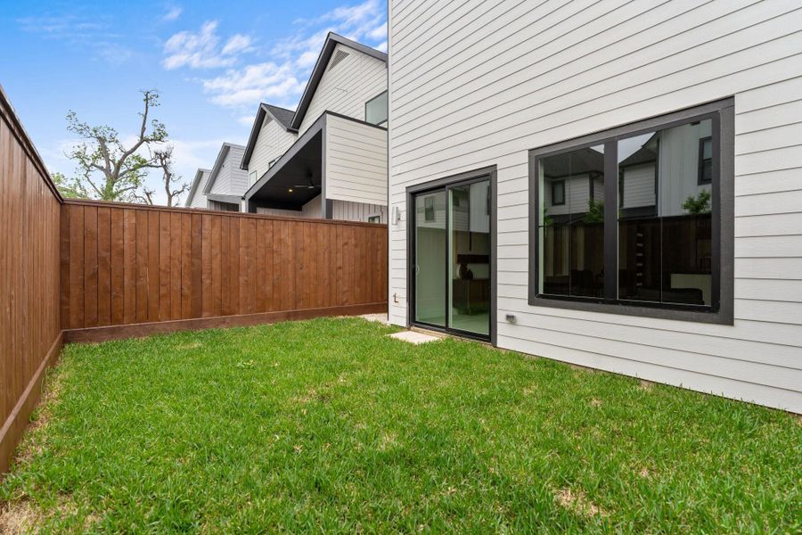 The front and back yards are professionally landscaped and thoughtfully designed with underground French drains for superior drainage The front and back yards are professionally landscaped and thoughtfully designed with underground French drains for superior drainage