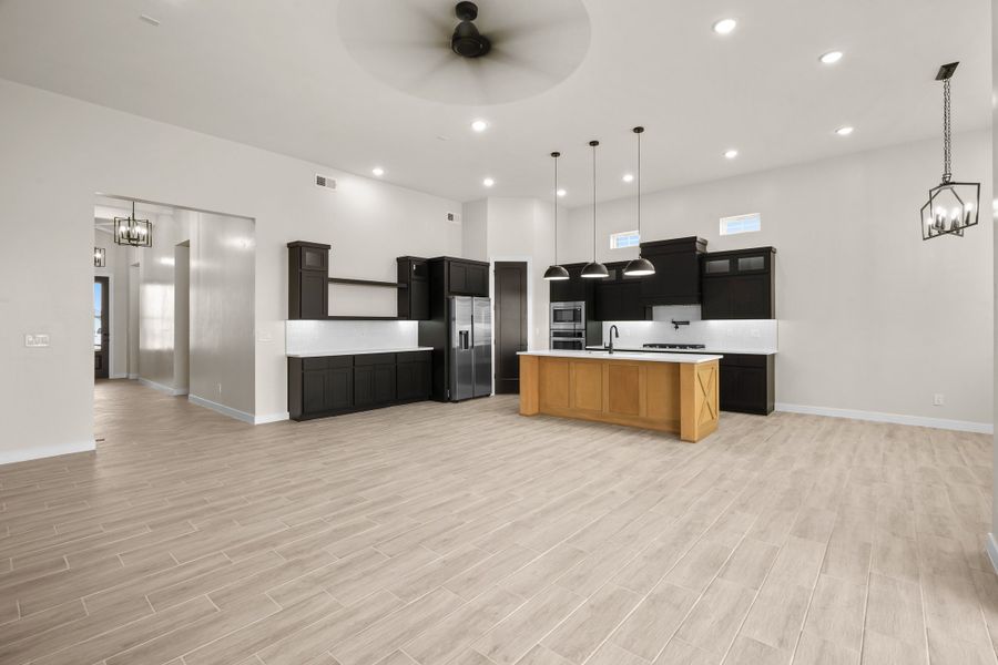Representative furnished interior of a home built from the Pebble Beach- II by LEH. Homes in Verdancia, El Paso (Image 11).