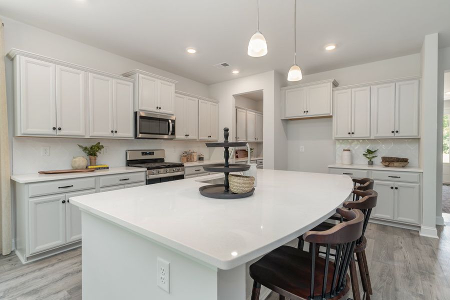 Representative furnished interior of a home built from the HARBOR OAK by D.R. Horton in Ranch Haven, Murrells Inlet (Image 19).