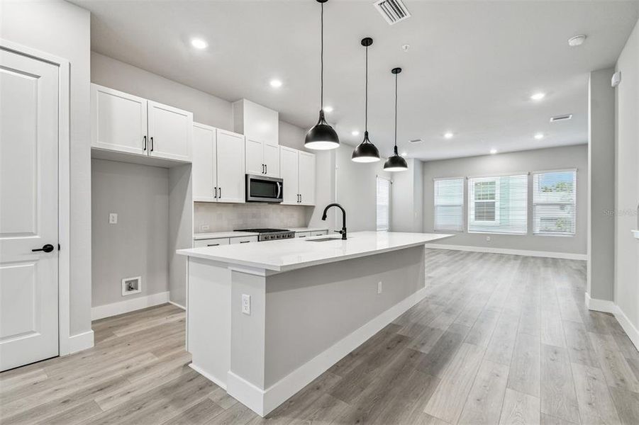 Furnished interior view inside a new home in Towns at Union, St. Petersburg (Image 9).