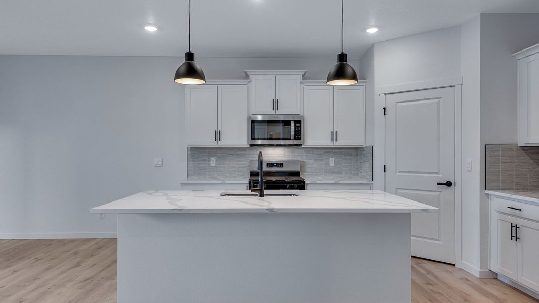 Furnished interior view inside a new home in Trails at Crowfoot, Parker (Image 3).