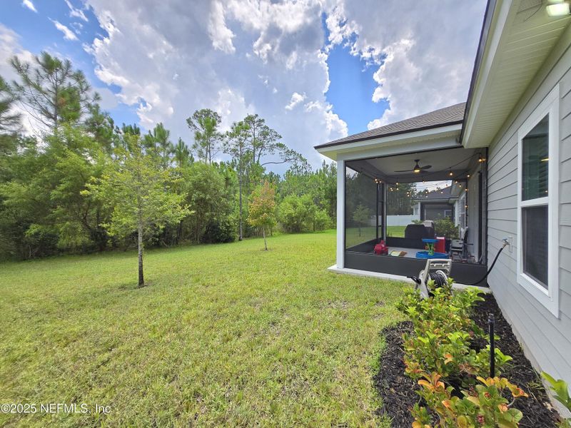Exterior details and patio area of a home in Sandy Creek, St. Augustine (Image 3).