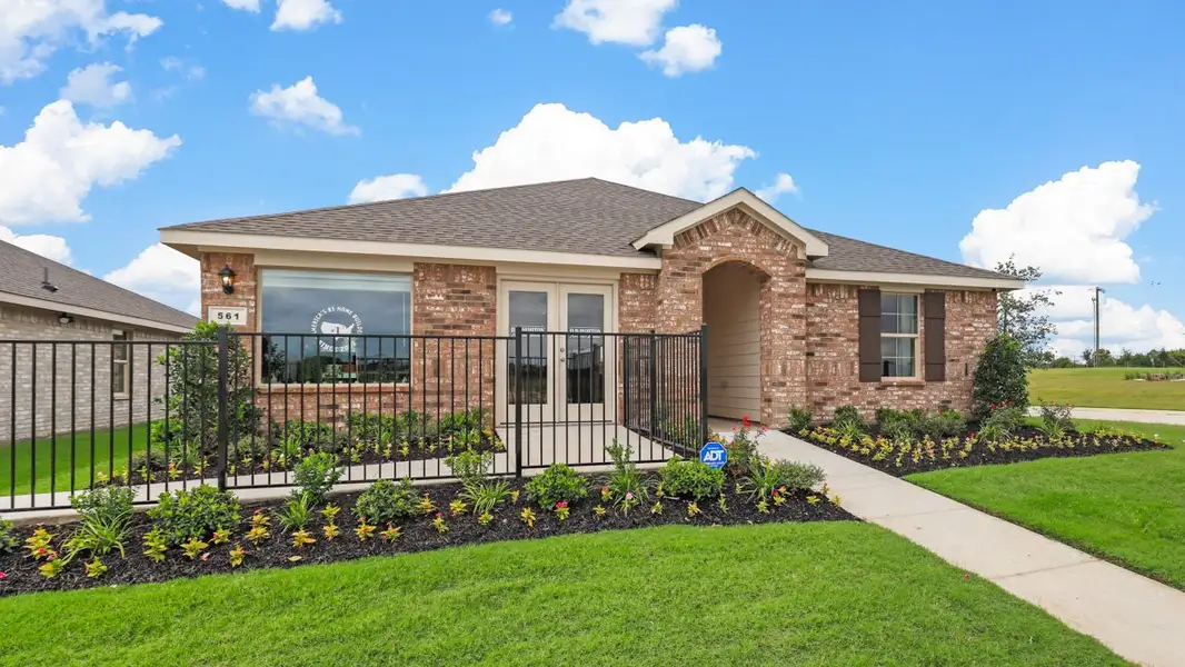 Front exterior of a new home in Meadowbrook Estates, Cleburne, TX, highlighting curb appeal (Image 22).