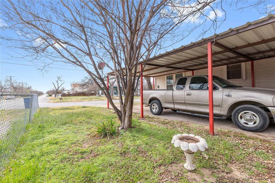 Exterior details and patio area of a home in , Brownwood (Image 17).