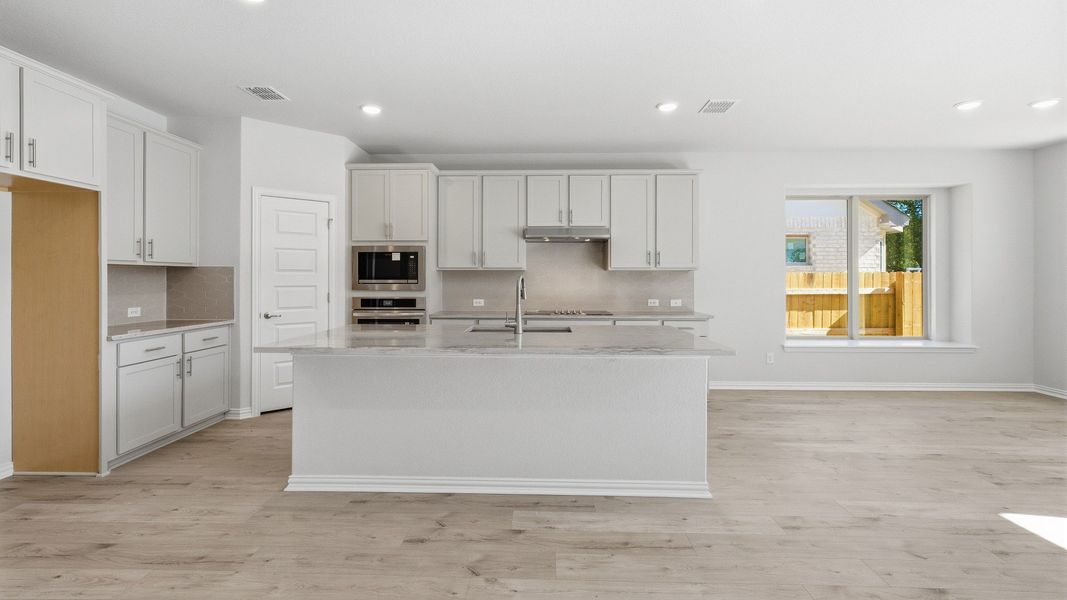 Furnished interior view inside a new home in Oaks at San Gabriel, Georgetown (Image 12).