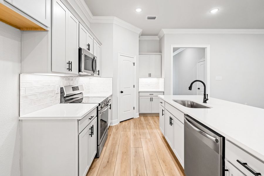 Furnished interior view inside a new home in Eagle Pointe, Pensacola (Image 6).