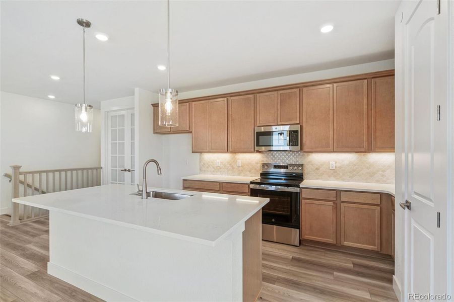 Furnished interior view inside a new home in Legato, Commerce City (Image 4).