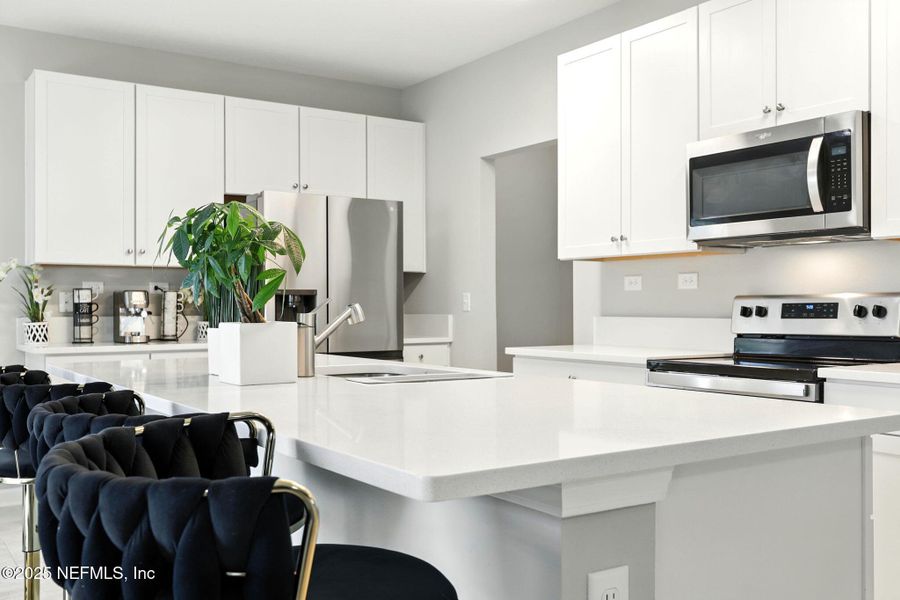 Furnished interior view inside a new home in , Jacksonville (Image 38).
