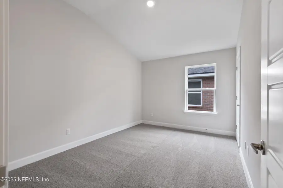 Spacious, unfurnished interior of a new home in Shadow Crest at Rolling Hills, Green Cove Springs (Image 20).