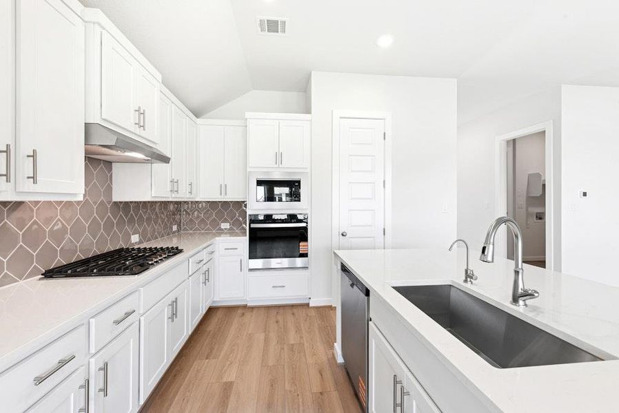 Furnished interior view inside a new home in The Colony, Bastrop (Image 5). Furnished interior view inside a new home in The Colony, Bastrop (Image 5).