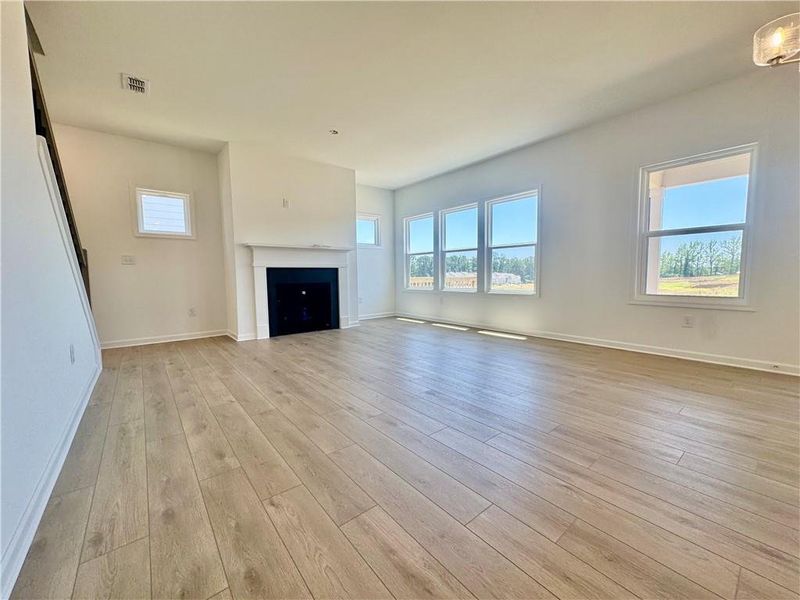 Spacious, unfurnished interior of a new home in Eastlyn Crossing, Flowery Branch (Image 14).