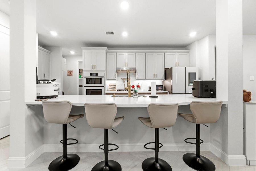 Furnished interior view inside a new home in , Magnolia (Image 11).