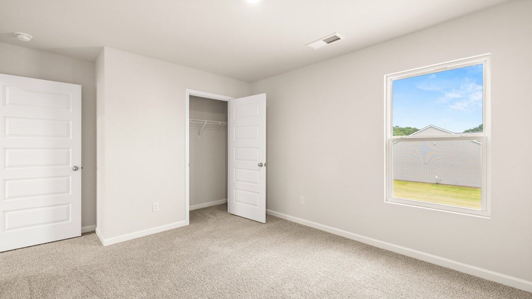 Representative unfurnished interior of a home built from the Elle by D.R. Horton in Preserve at Dove Creek, Statham (Image 32).