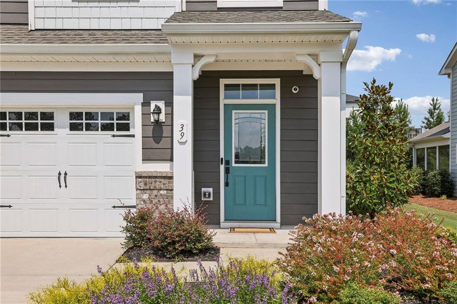Front exterior of a new home in , Hoschton, GA, highlighting curb appeal (Image 16).