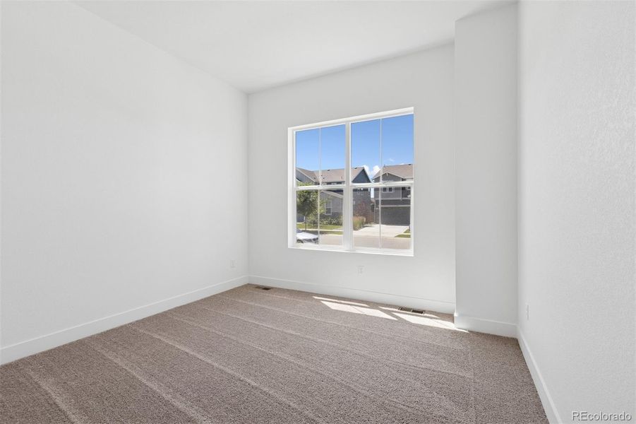 Spacious, unfurnished interior of a new home in Painted Prairie Cottage, Aurora (Image 30).
