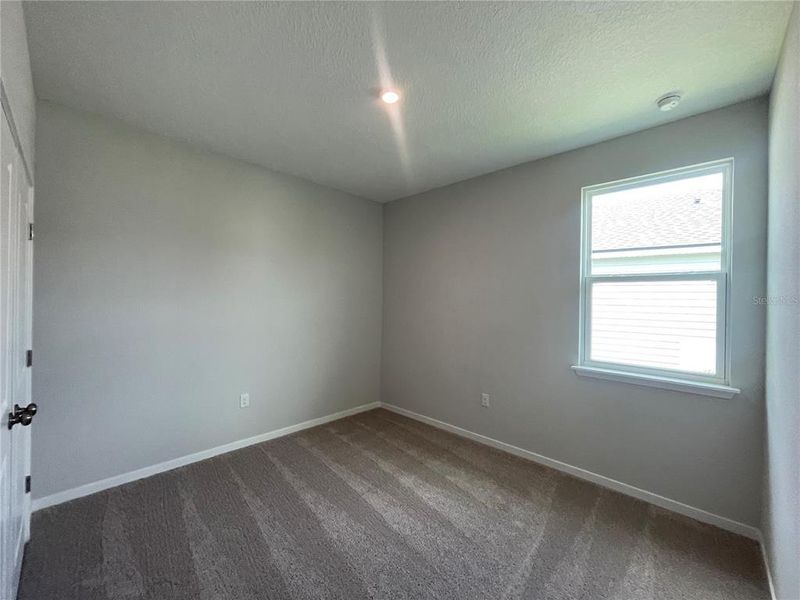 Spacious, unfurnished interior of a new home in Magnolia Series at Seminole Palms, Palm Coast (Image 17).