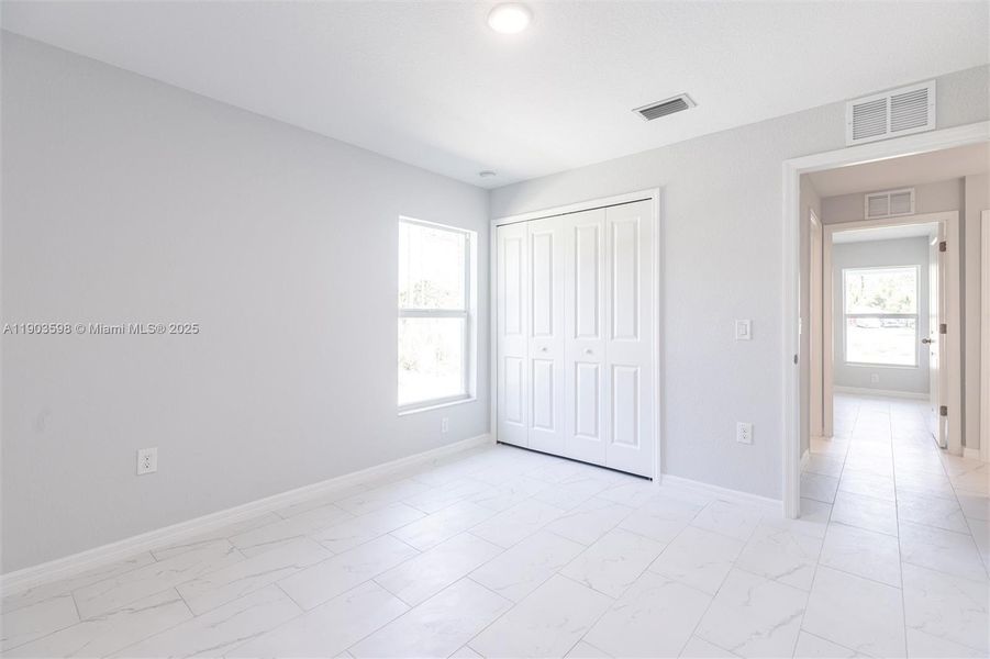Spacious, unfurnished interior of a new home in , Lehigh Acres (Image 17). Spacious, unfurnished interior of a new home in , Lehigh Acres (Image 17).