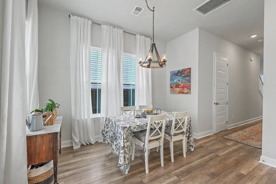 Furnished interior view inside a new home in Limehouse Village: Row Collection, Summerville (Image 9).