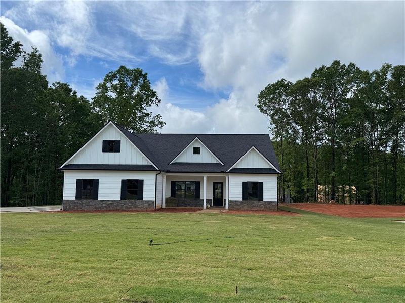 Front exterior of a home in the Benson Estates community, located in Dallas, GA (Image 1).