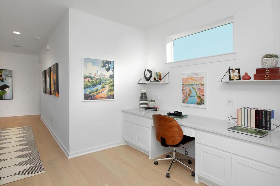 Furnished interior view inside a new home in Rough Hollow The District, Lakeway (Image 16).
