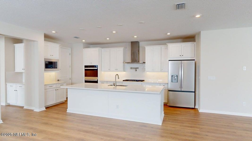 Furnished interior view inside a new home in RiverTown - WaterSong, St. Johns (Image 4). Furnished interior view inside a new home in RiverTown - WaterSong, St. Johns (Image 4).