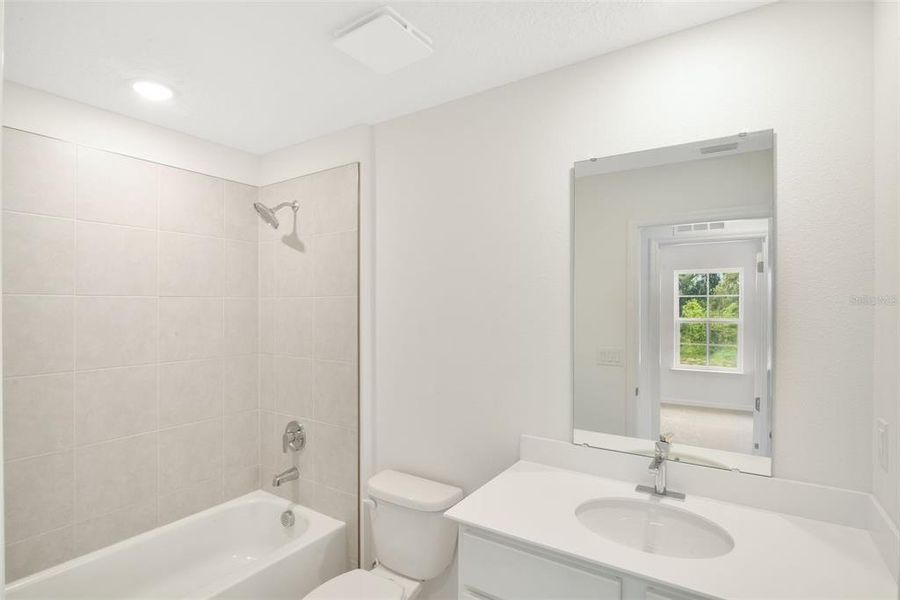 Furnished interior view inside a new home in Delaney Reserve, Deland (Image 30).