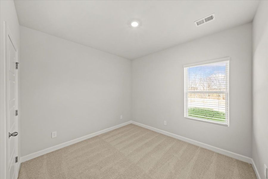 Spacious, unfurnished interior of a new home in The Farm at Wells Creek - Signature Collection, Gray Court (Image 15).