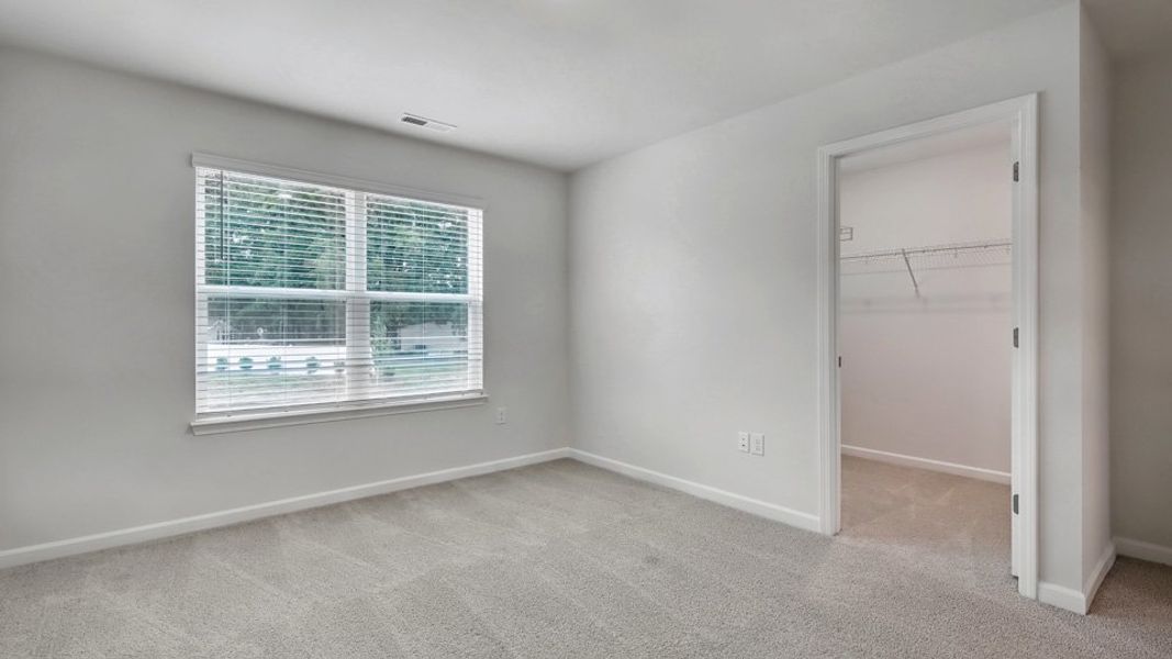 Spacious, unfurnished interior of a new home in The Townes at Honeycutt Oaks, Angier (Image 19).