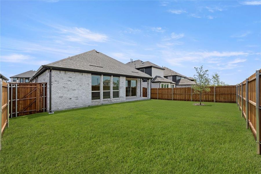 Front exterior of a new home in Brookfield, Melissa, TX, highlighting curb appeal (Image 2).