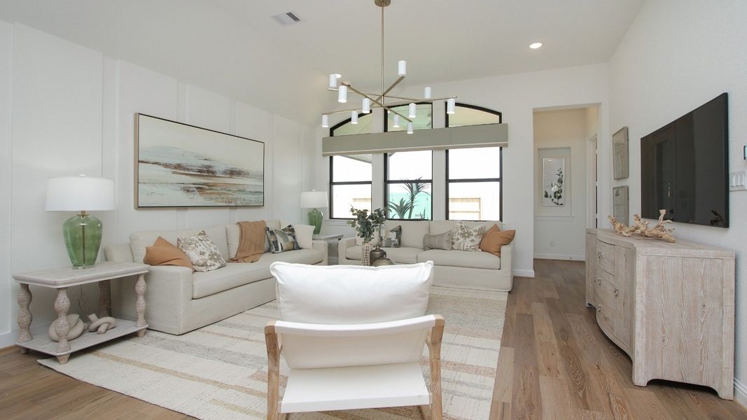 Representative furnished interior of a home built from the Juniper by Brightland Homes in Sunterra, Katy (Image 7).