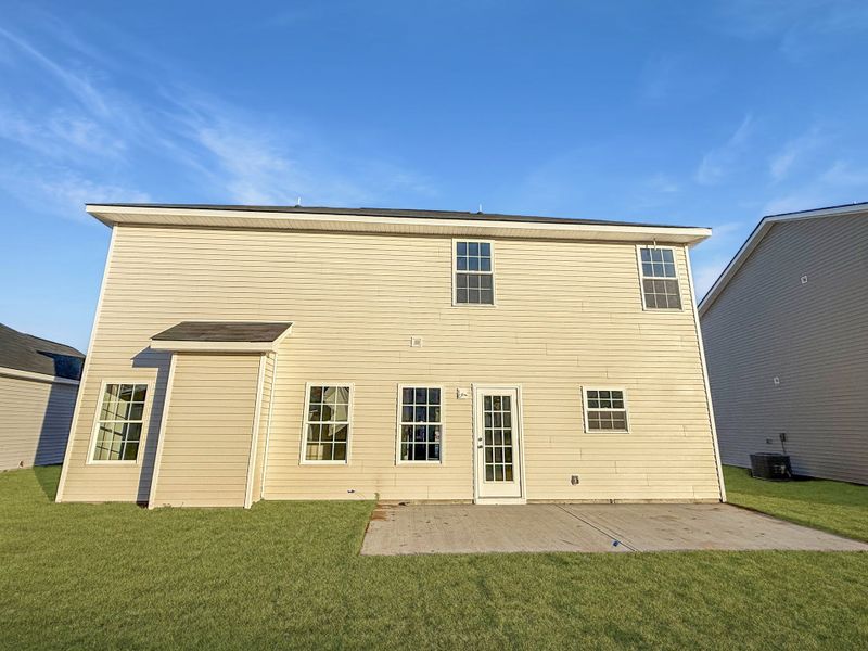 Exterior details and patio area of a home in Grand Reserve, Hinesville (Image 2).