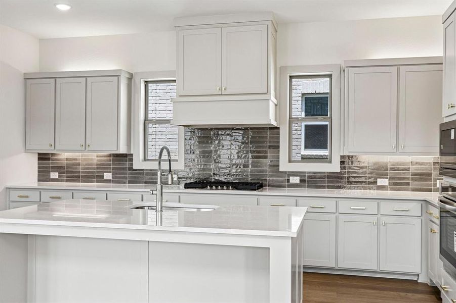 Beautiful cabinetry and gorgeous countertops paired with contemporary stainless steel create the kitchen of your dreams!