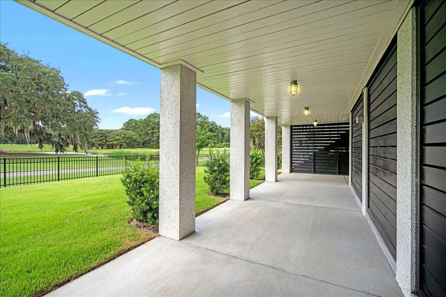 Exterior details and patio area of a home in , Johns Island (Image 29).