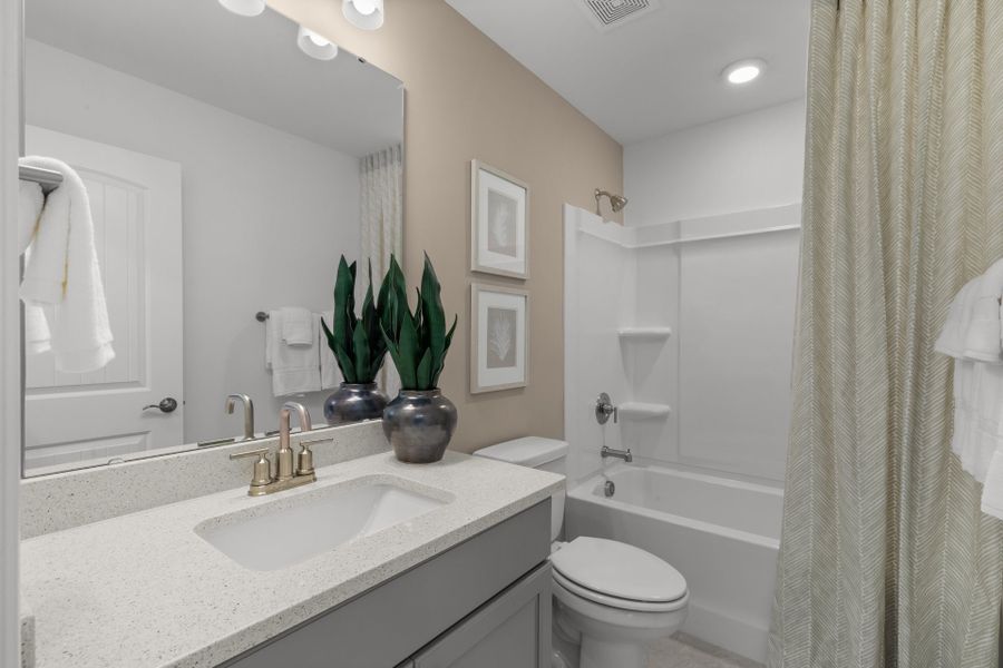 Representative furnished interior of a home built from the The Shorebreak by Chesapeake Homes in Coastal Club of the Carolinas, Calabash (Image 46).