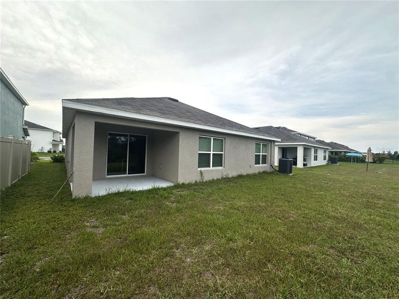 Exterior details and patio area of a home in Silverstone North, Palmetto (Image 27).