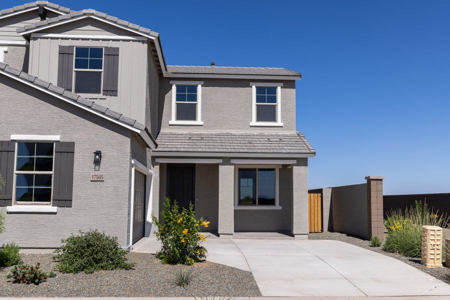 Front exterior of a new home in Rancho Santa Rosa, Maricopa, AZ, highlighting curb appeal (Image 19).