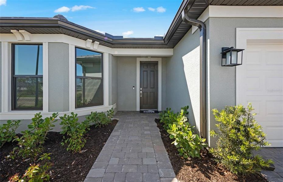 Exterior details and patio area of a home in , North Port (Image 15).