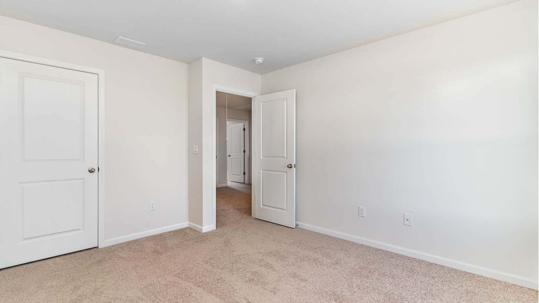 Spacious, unfurnished interior of a new home in Auberon Woods, Conway (Image 16).